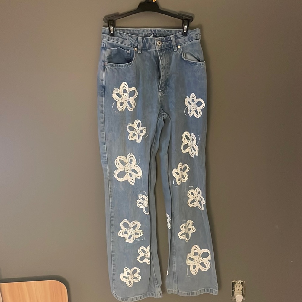 Blue jeans with white flower design size 26